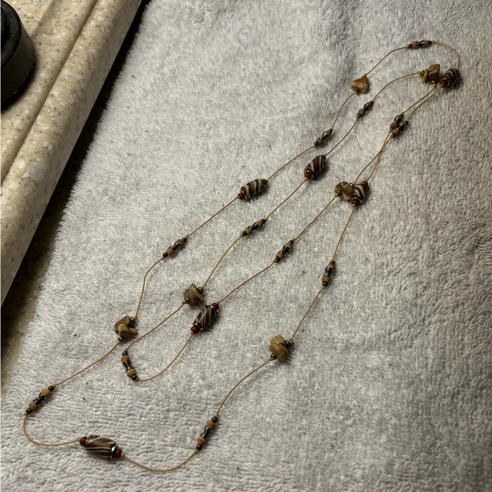 Earthtone handmade beads & stone beads with rope string. Overall 50”